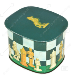Vintage tin Tomado with image of chess pieces