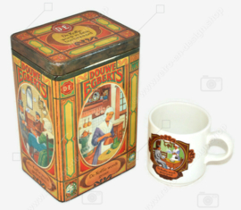 Tin coffee canister by Douwe Egberts with nostalgic images and matching cup