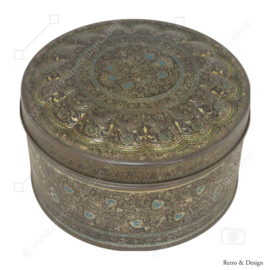 Round vintage tea tin with fine tendril motif in relief by De Gruyter