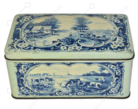 Rectangular vintage tin with hinged lid, decorated in blue and white, depiction: Dutch meadow landscapes