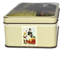 Vintage grey tin with color pictures of Frisian subjects