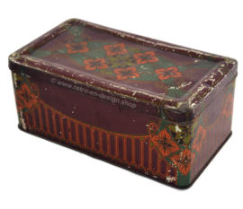 Antigua caja de lata de brocante con estampado floral estilizado
