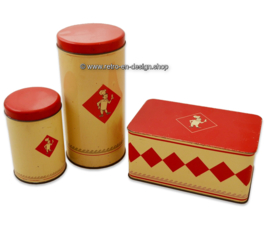 Conjunto de tres latas color crema vintage con tapa roja por "Bolletje"