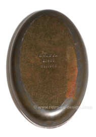 Vintage oval chocolate tin by Kwatta with an image of a soldier