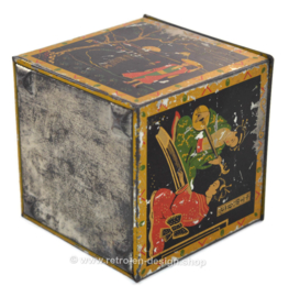 Vintage tea tin in cube shape with oriental images