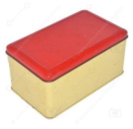 Vintage cream-coloured tin with red hinged lid