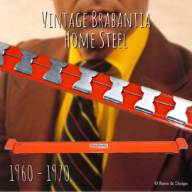 Corbatero naranja vintage de Brabantia con diez clips de metal
