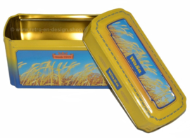 Geel met blauwe blikken doos voor Crackers van Wasa met afbeelding van rijp graan