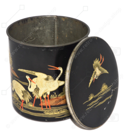 Round vintage tin for tea or cocoa from De Gruyter decorated with various oriental birds