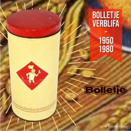 Bote de estaño para galletas de color amarillo crema fabricado por Bolletje con tapa roja