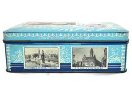 Blauw vintage blik met foto's van zeeland