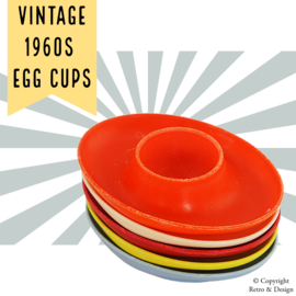 Retro charme op uw ontbijttafel: Vintage Plastic Eierdoppen Set