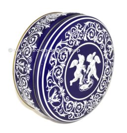 Round blue and white biscuit tin with cherubs, chubby child figure with wings