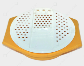 Vintage Tupperware slicing bowl in yellow with white grater and transparent lid