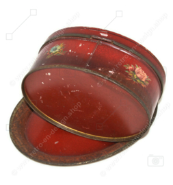 Oval vintage antique dark red candy tin with flower decoration and saucer