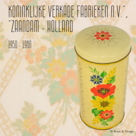 Lata de galletas vintage cilíndrica amarilla de Verkade, con flores de colores