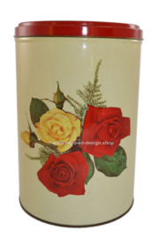 Runde vintage Blechdose mit Rosen auf krakelee Oberfläche