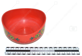 Vintage hard plastic mixing bowl made by Emsa with green floral decoration