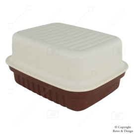 "Experience the timeless elegance of the Vintage Tupperware 'Kornuit' Cheese Box - A Stylish Throwback in White and Dark Brown!