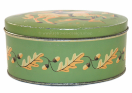 Oval biscuit tin by Verkade Zaandam with horse, rider and hunting dog.