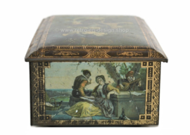 Vintage tin drum with paintings of Old Masters
