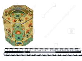Octagonal vintage faceted tin with double-walled lid and oriental floral motifs