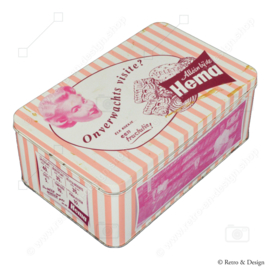 Boîte rétro rose pour biscuits par Hema avec des photos de l'intérieur de la boutique