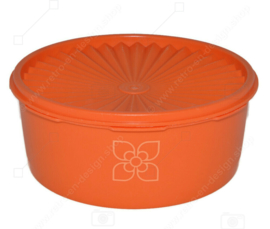 Vintage Tupperware koektrommel met ster- of zonnedeksel en gestileerde bloem op voorzijde