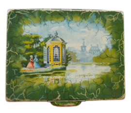 Vintage green tea tin by Douwe Egberts with image of two ladies at a tea house
