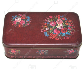 Boîte rectangulaire vintage rouge foncé avec motif de fleurs multicolores et craquelé