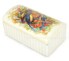 Vintage tin with rounded hinged lid and an image of birds and flowers