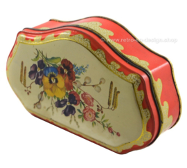 Red vintage tea tin by the Gruyter with spring or summer bouquet