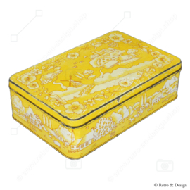 Yellow biscuit tin by Verkade with a decor of a drawn Dutch landscape