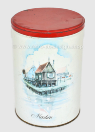 Vintage tin storage container with a watercolour of wooden houses on Marken