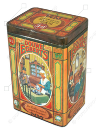 Tin coffee canister by Douwe Egberts with nostalgic images and matching cup