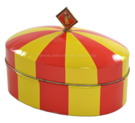 Galleta vintage ovalada en rojo y amarillo, en forma de carpa de circo de Bolletje