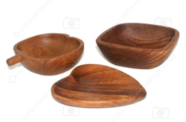 Set of three wooden vintage dishes in heart, apple and square shape