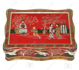 Vintage tea tin in red, green, gold and black with oriental images
