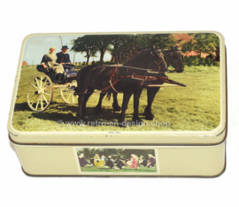 Vintage grey tin with color pictures of Frisian subjects