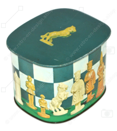 Vintage tin Tomado with image of chess pieces