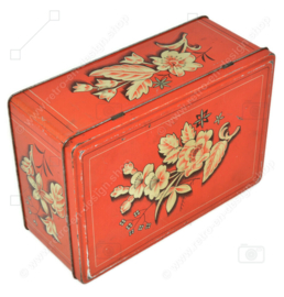 Vintage rectangular tin with a stylized floral pattern with leaf