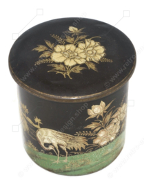 Round vintage tin tea caddy/cocoa bus by De Gruyter decorated with flowers and cranes
