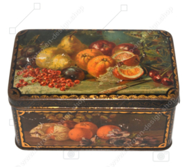 Vintage candy or cookie tin with still lifes of fruit pieces on all sides