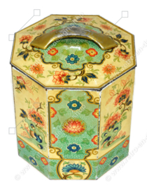 Octagonal vintage faceted tin with double-walled lid and oriental floral motifs