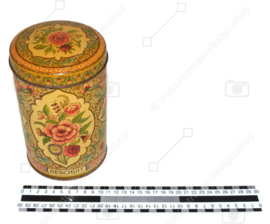 Round rusk tin with an image of flowers in a beautiful vintage condition