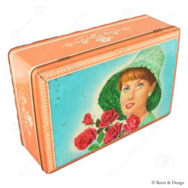 Lata de caramelo vintage mediana de Lonka con una nostálgica imagen de una mujer con rosas