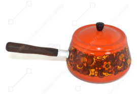 Vintage enamel orange fondue set made by Brabantia with floral pattern and wooden handle