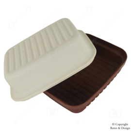 "Experience the timeless elegance of the Vintage Tupperware 'Kornuit' Cheese Box - A Stylish Throwback in White and Dark Brown!