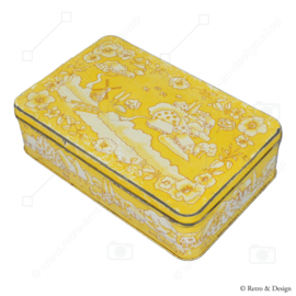 Boîte à biscuits jaune de Verkade avec un décor d'un paysage hollandais dessiné