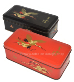 Set of vintage tins in black and red by DE GRUYTER with oriental birds decoration